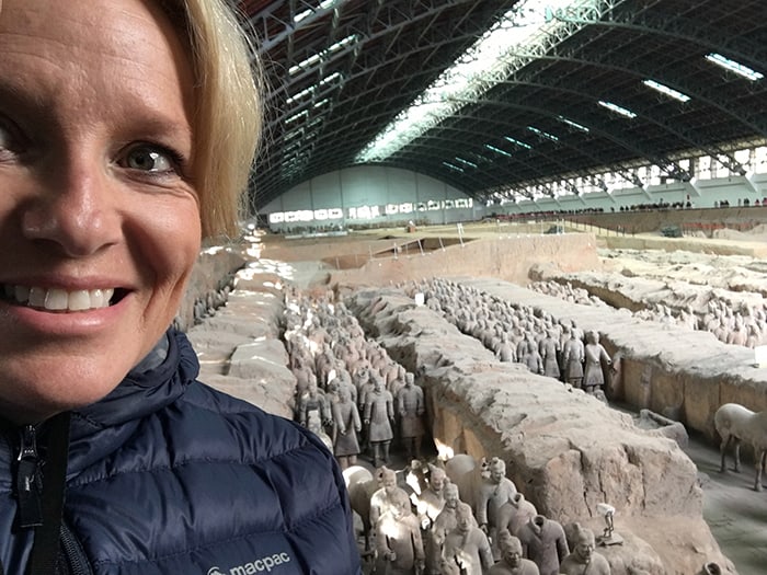 Standing in front of the terracotta warriors