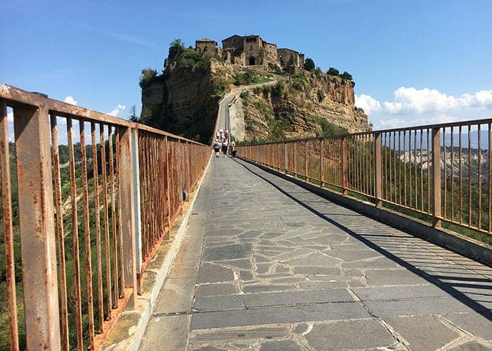 Walk to hilltop town in Italy