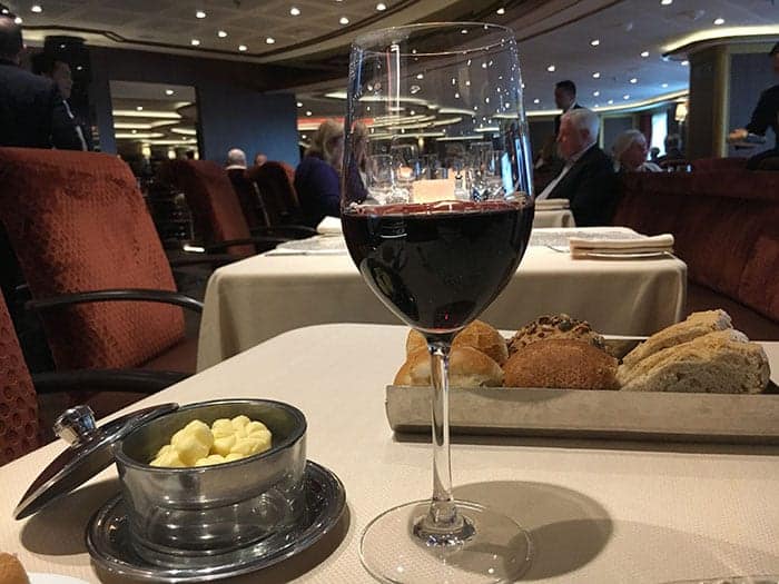 Glass of red wine on table