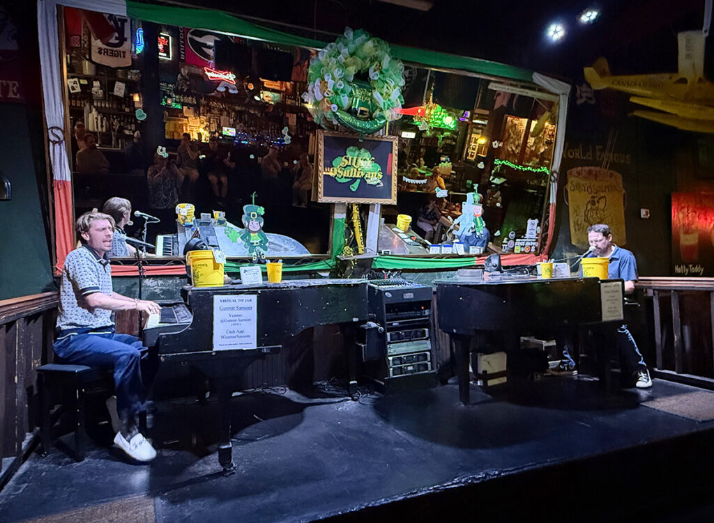 Silky O'Sullivans piano bar going off with two musicians on two pianos