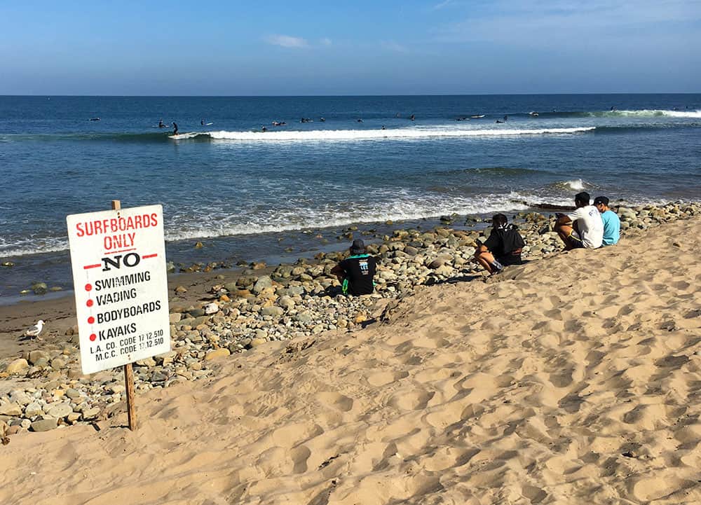 Surfboards only sign on Malibu Beach