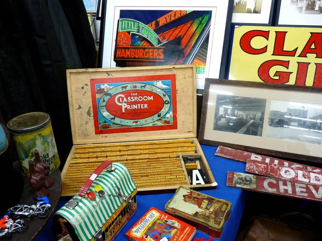 Vintage tins and signs at Chelsea Flea