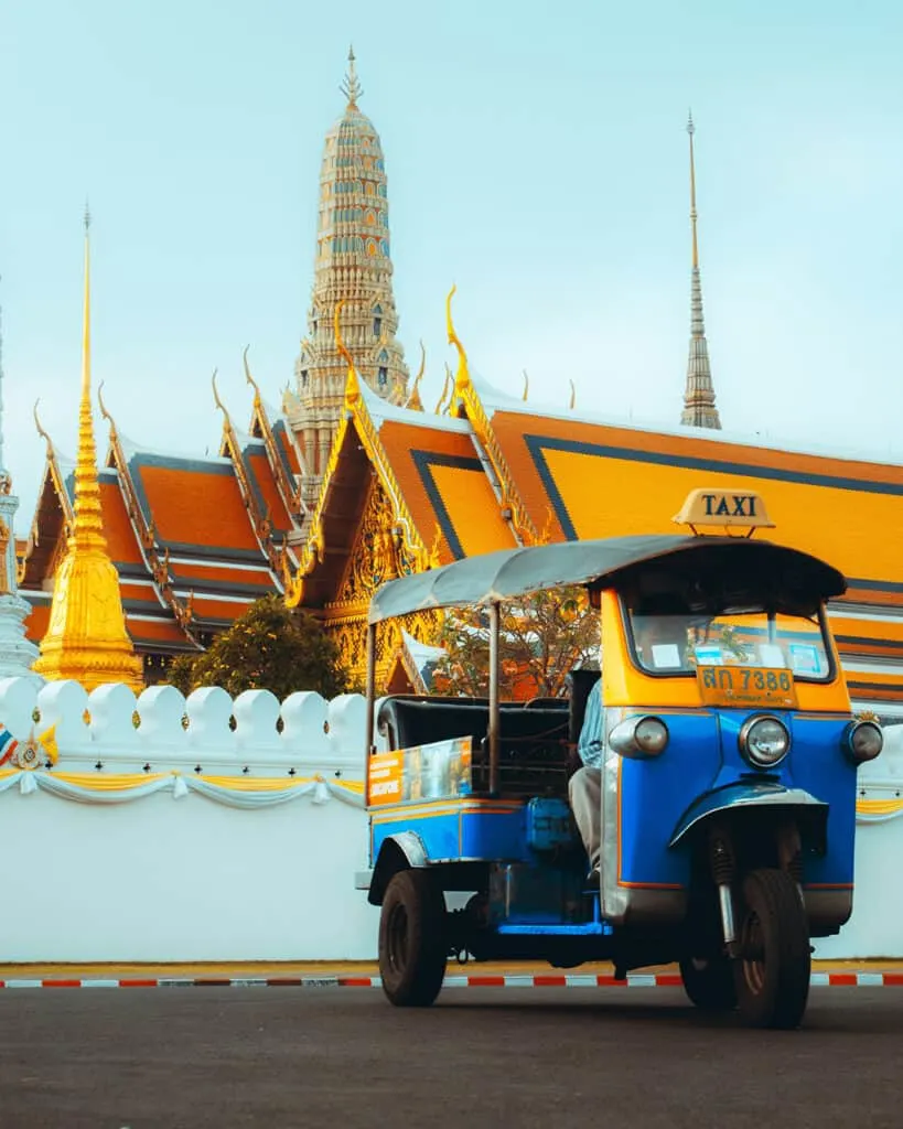 A tuk tuk taxi in front of the Grand Palace