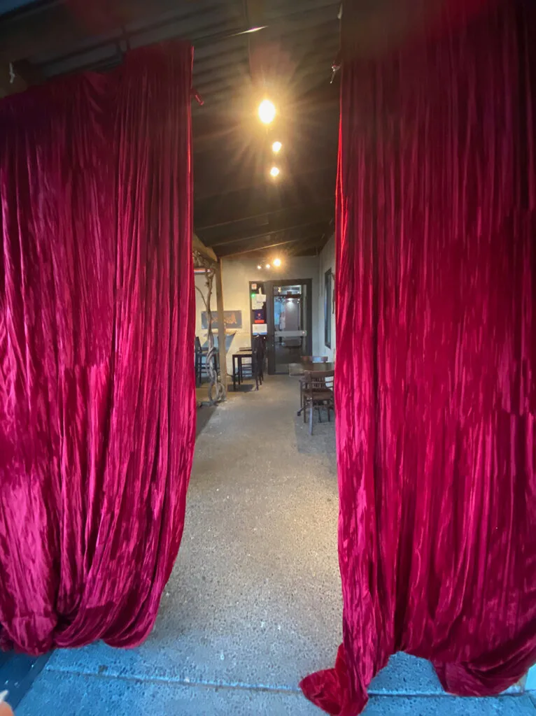 Enter through the velvet curtains at Deliciosa