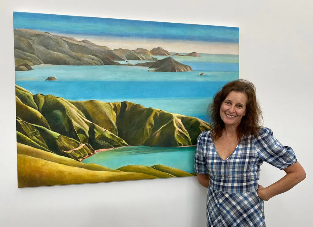 Melanie Roger with a Stanley Palmer painting
