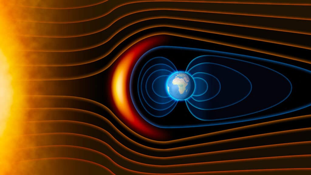 Medan magnet bumi, digambarkan dengan warna biru