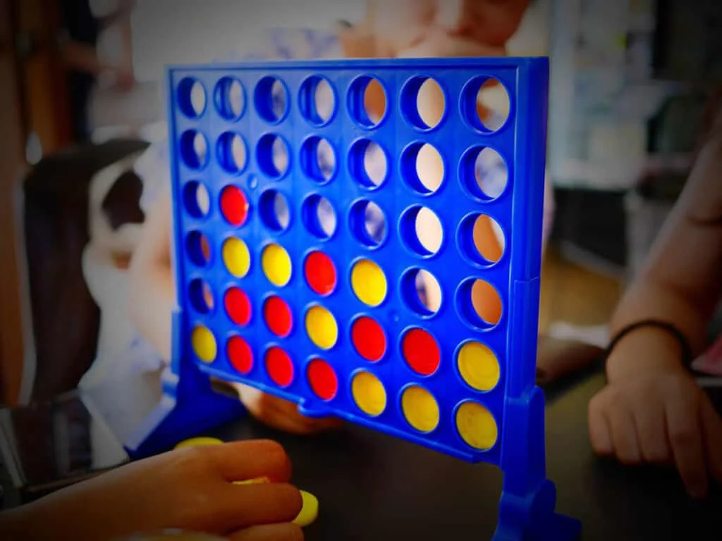 Kids playing Connect Four