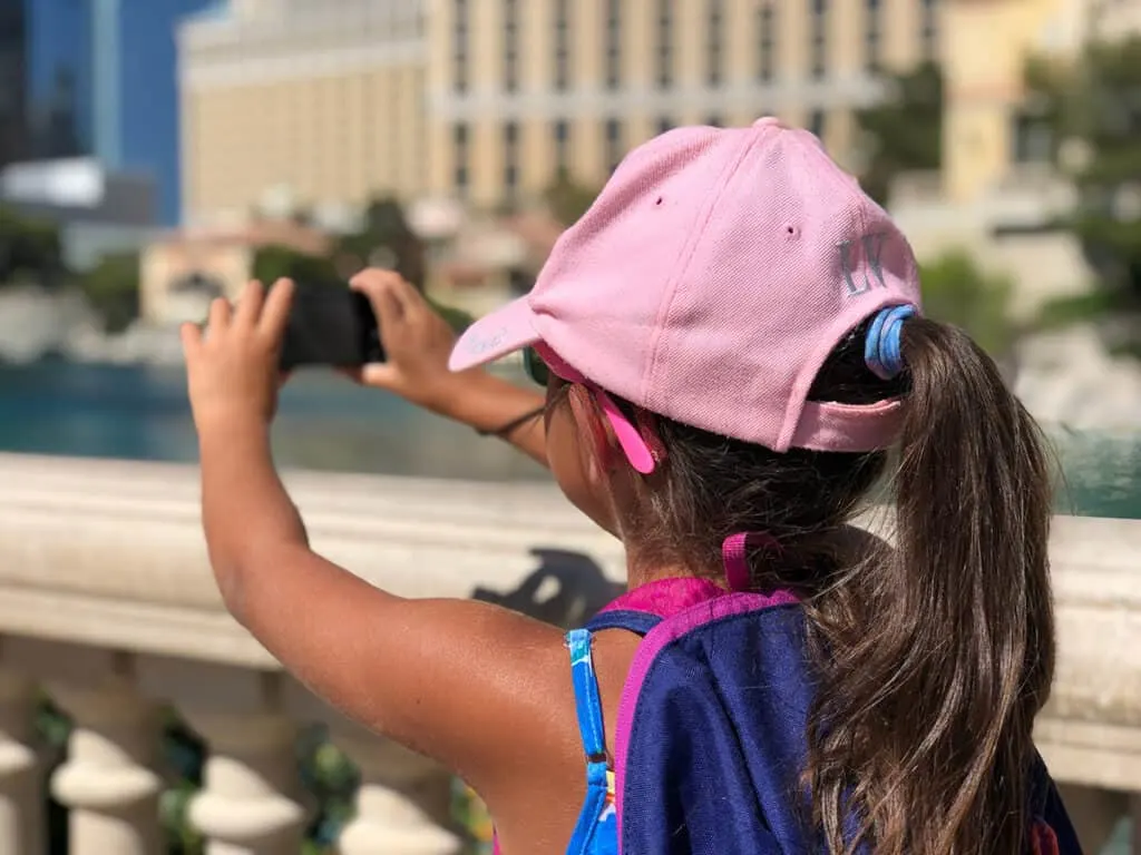 Girl taking photos of Las Vegas