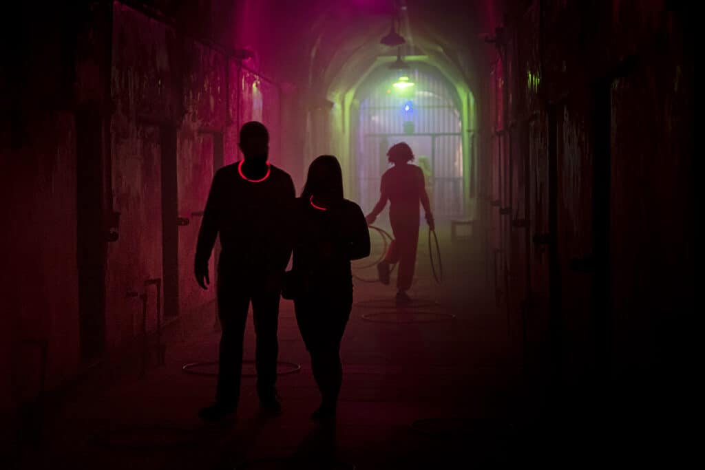 Eastern State Pen Halloween nights couple in dark