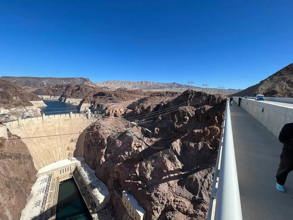 Looking down at Hoover Dam from road bridge