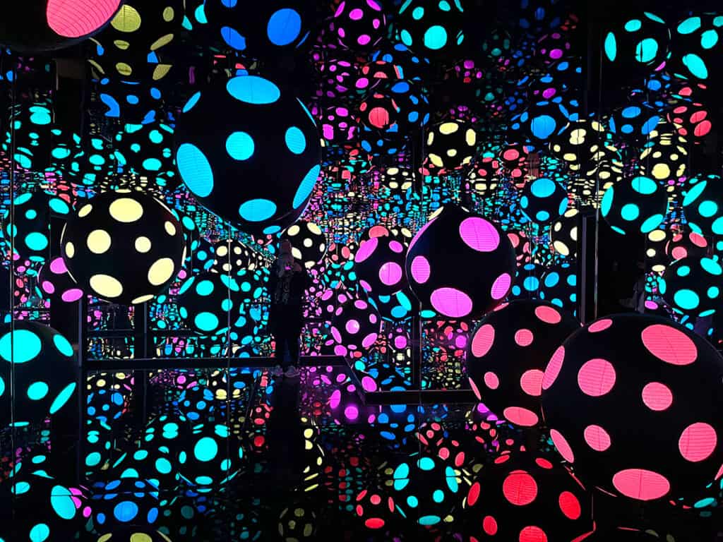 Neon balls and dots. Yayoi Kusama installation