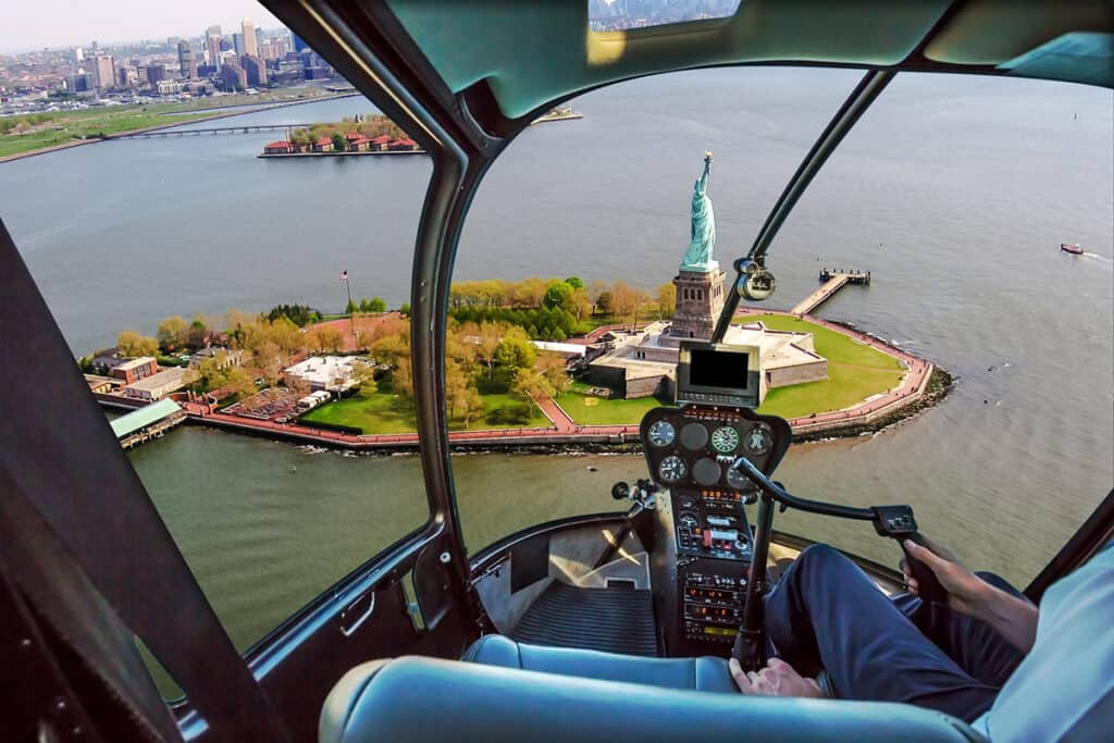 Helicopter view over Statue of Liberty
