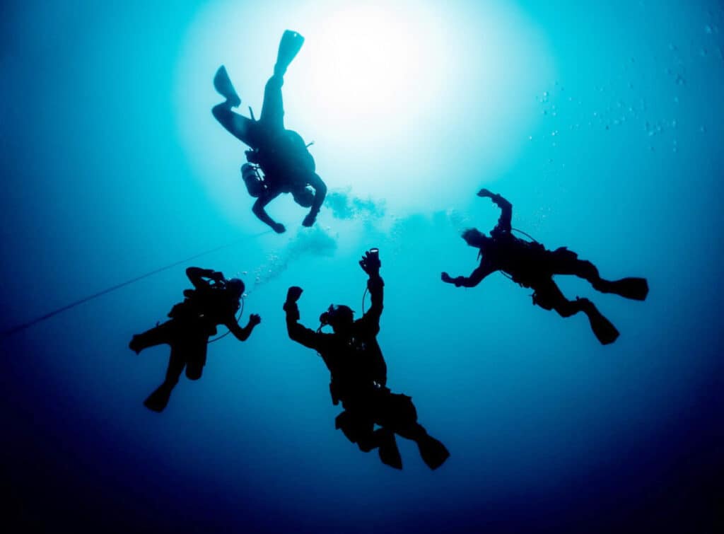 Scuba diving with a group in Malta