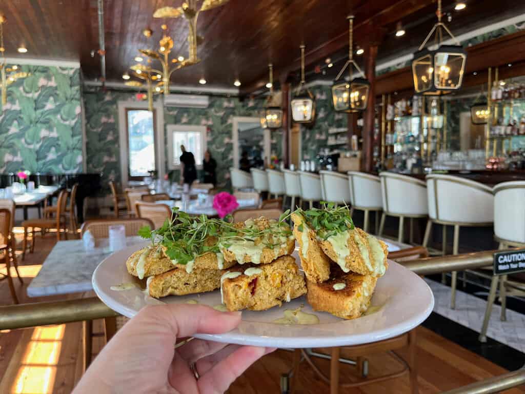 Fried green tomatoes on cornbread at Sugar and Rye