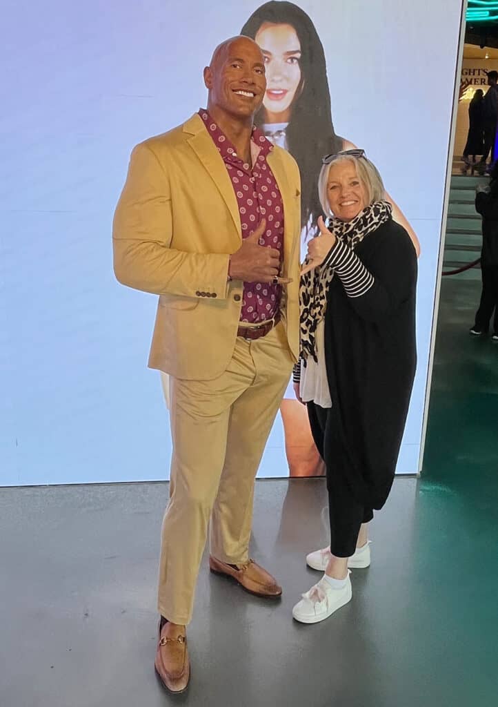 Megan posing with the Rock at Madame Tussaud