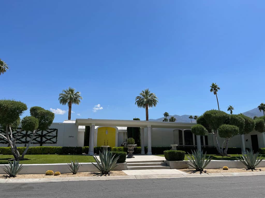 Palm Springs mid-century modern home with oversized front door