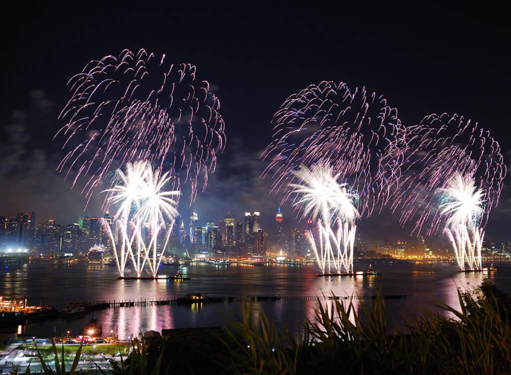 Fireworks on barges in the East River