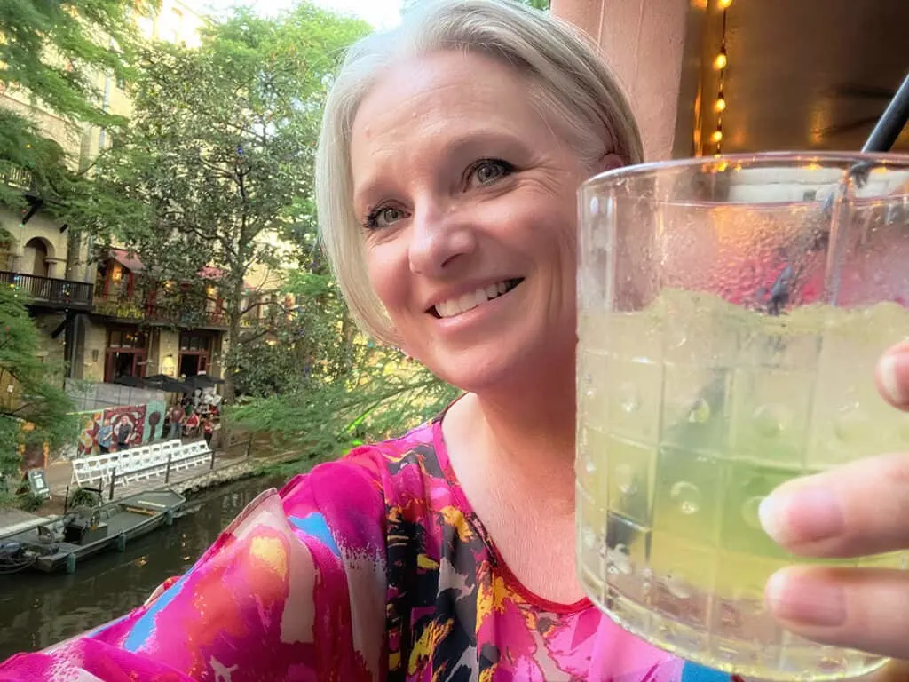 Megan with cocktail at Riverwalk