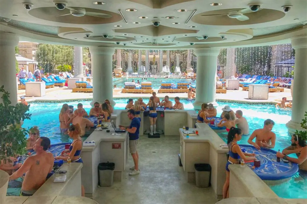 11 of the best pools in Las Vegas! 14 Caesar's Palace swim-up blackjack tables and bar