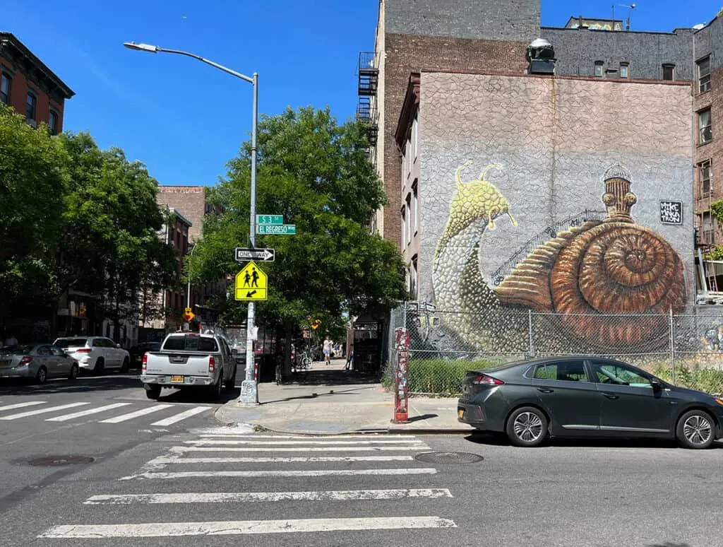 Explore New York's street art scene 6 giant snail mural by Mike Makatron