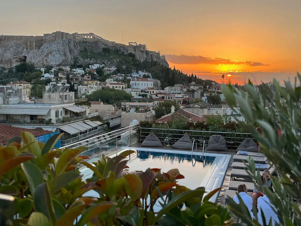 Our rooftop pool at sunset facing the Acropolis