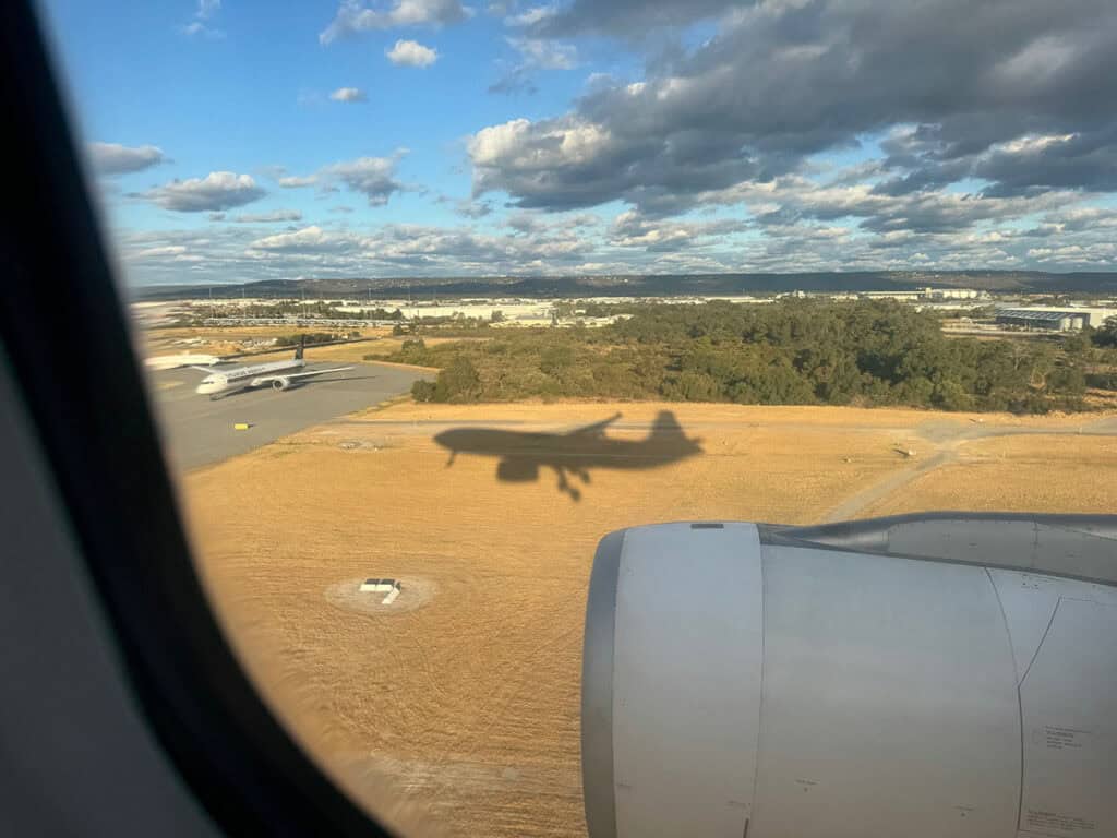 Shadow of plane landing in Perth