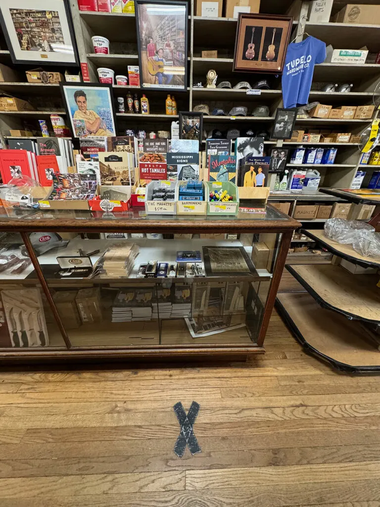 X on floor in Tupelo Hardware Co
