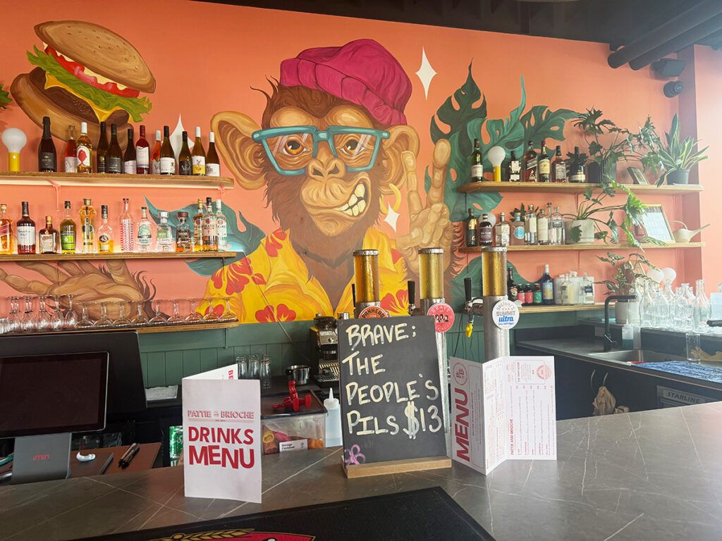 Pattie & Brioche mural art at the bar
