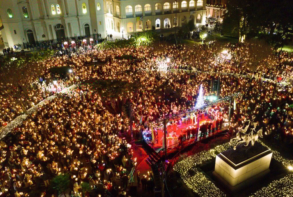 Christmas carollers filling Jackson Square