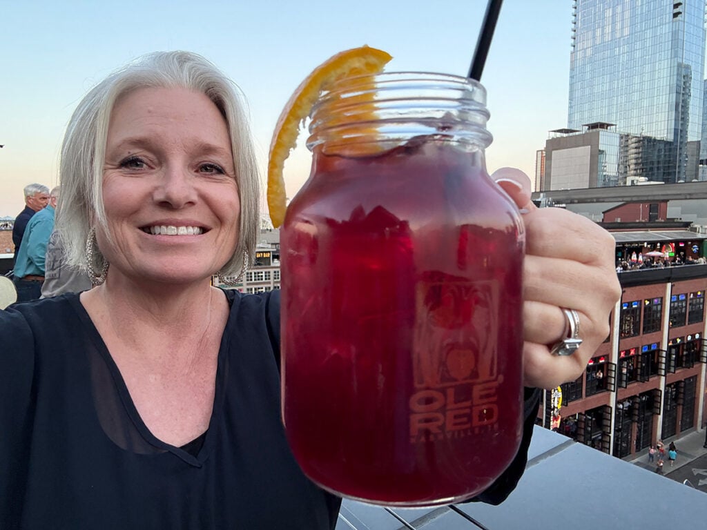 Megan at Ole Red with a large sangria cocktail