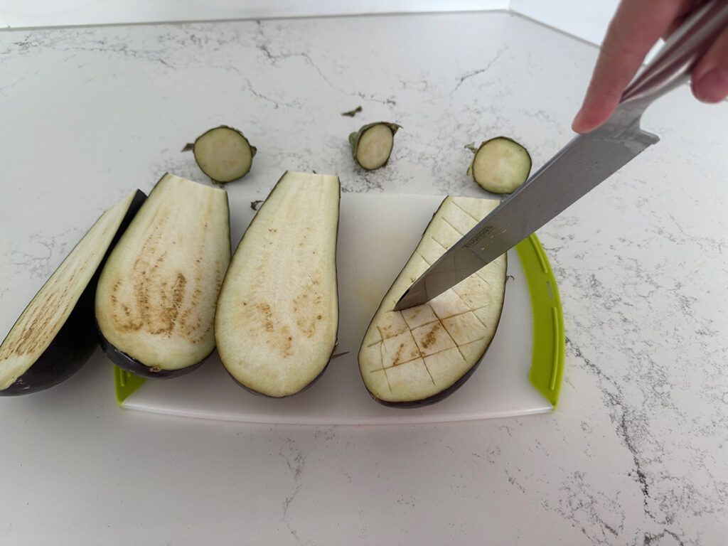 scoring eggplants