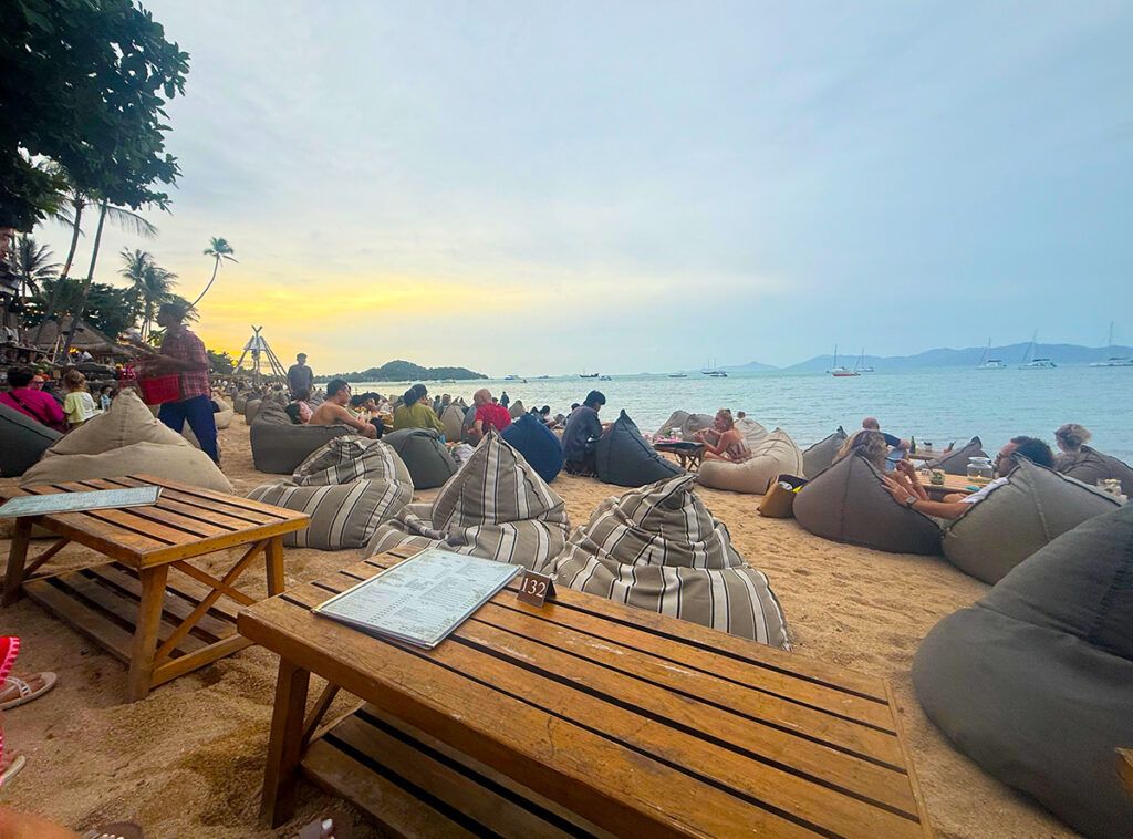 Bean bags on the beach in front of Coco Tam's