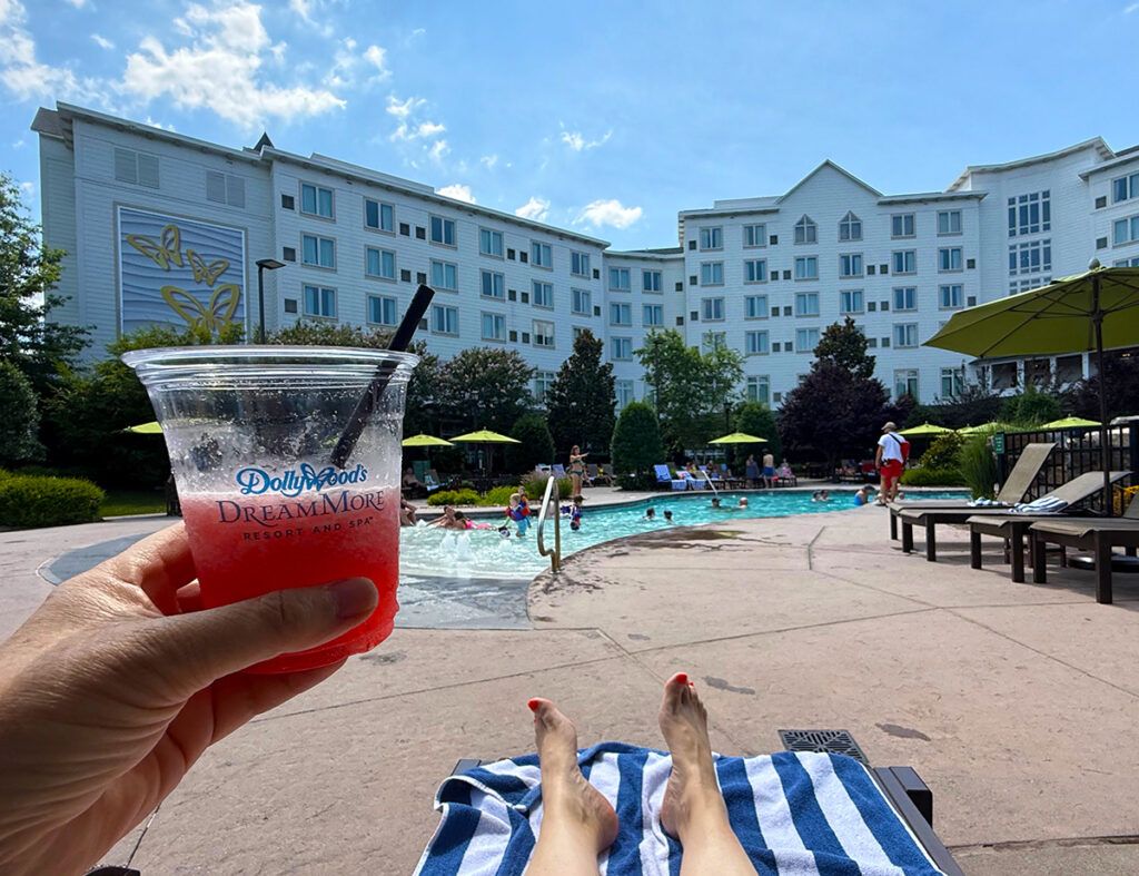 Drinking a sangria by the pool at DreamMore resort