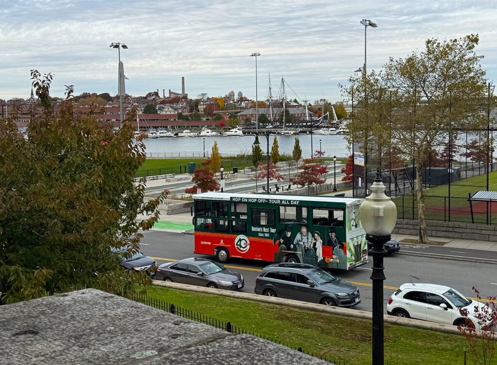 Hop On Hop Off bus driving through Boston