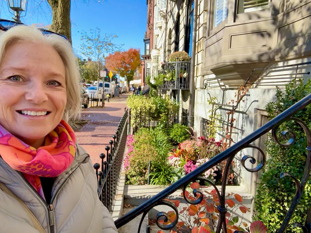 Megan on steps of townhouses in Beacon Hill