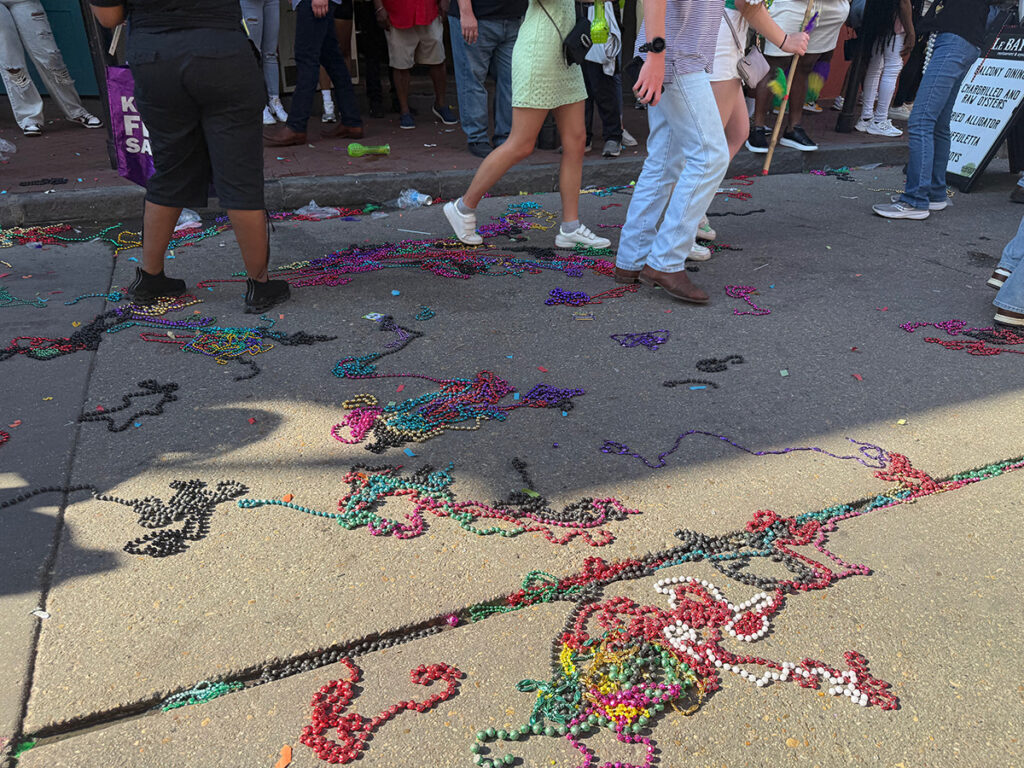 Swathes of broken beads on the ground