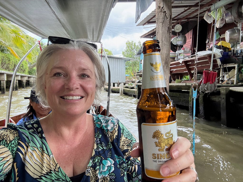 Megan with beer at floating market