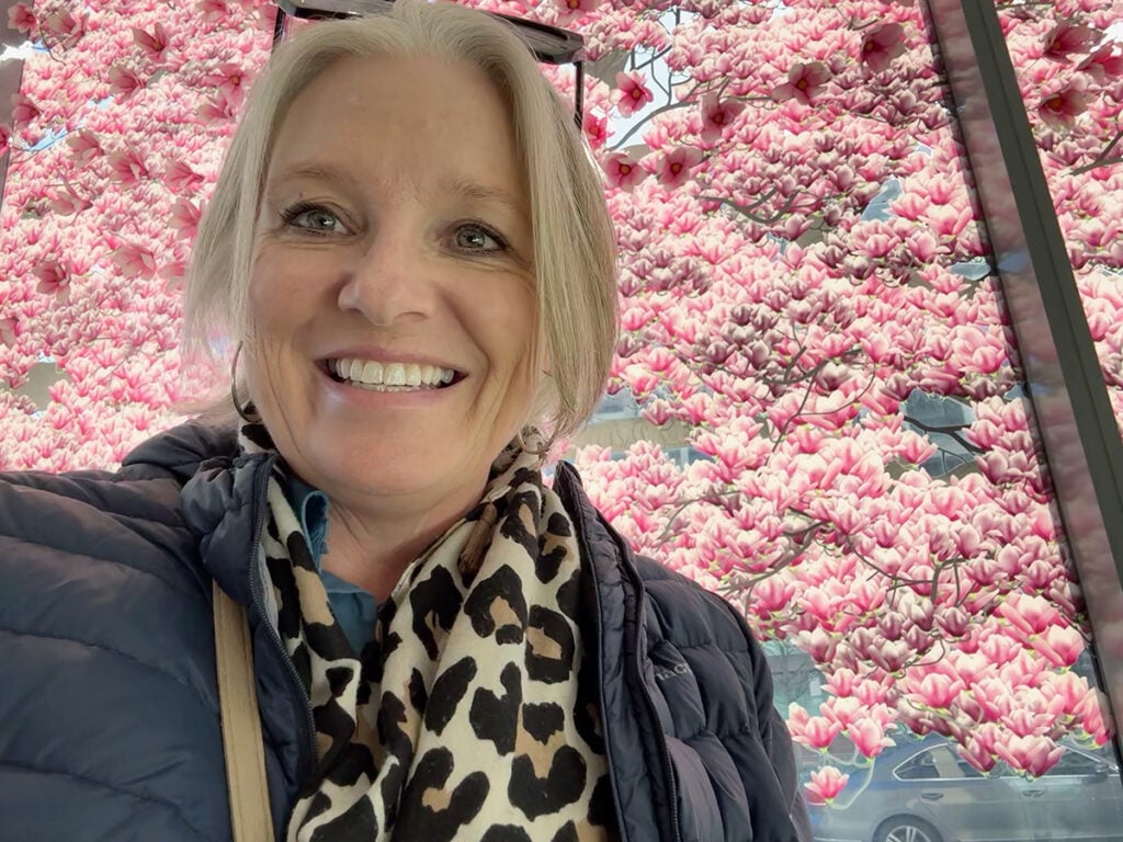 Megan in front of blossom window, The People's House Washington DC