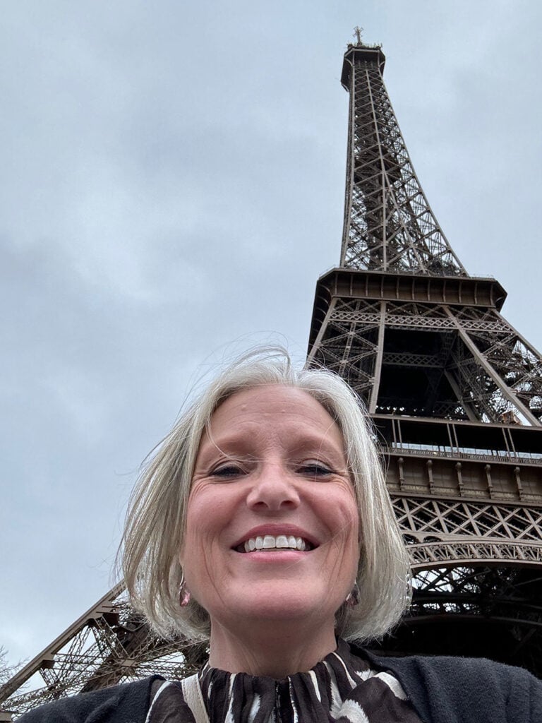 Megan in front of the Eiffel Tower