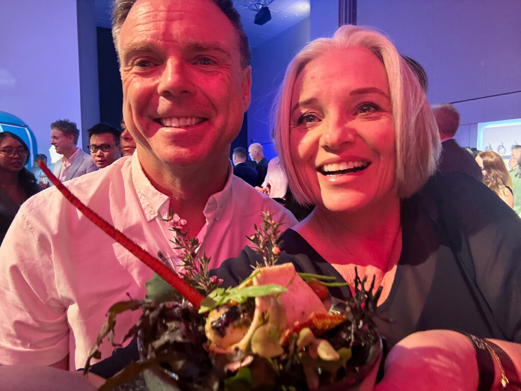 Megan with Ben Bayly from Ahi who made crayfish "saveloys" for guests to try after the ceremony