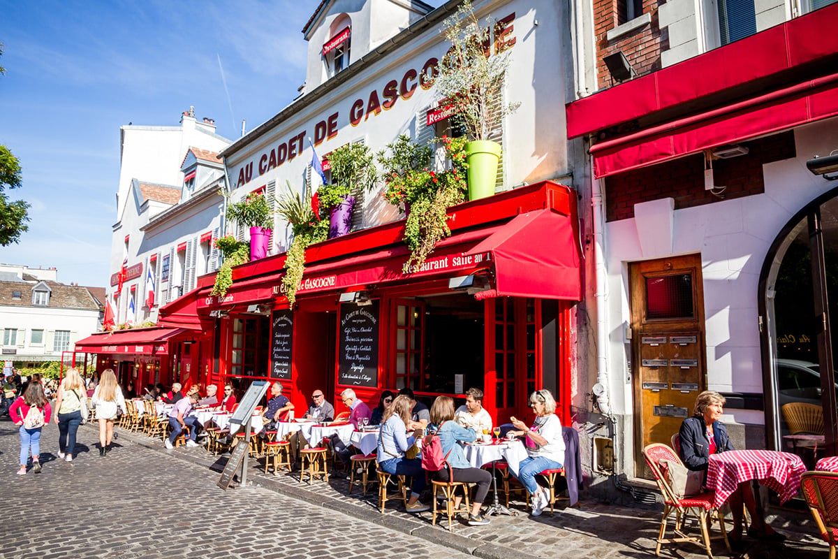 Cafe diners in Montmartre sitting at outdoor tables