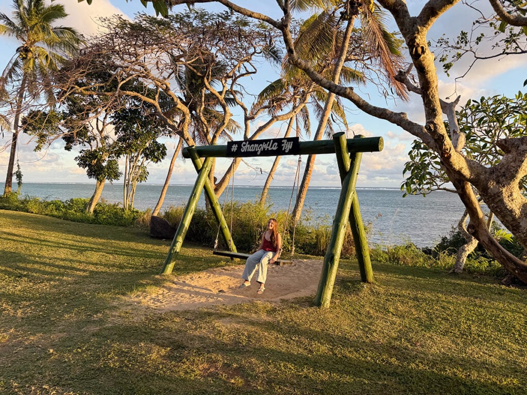 Niece on Shangri La swing at sunset