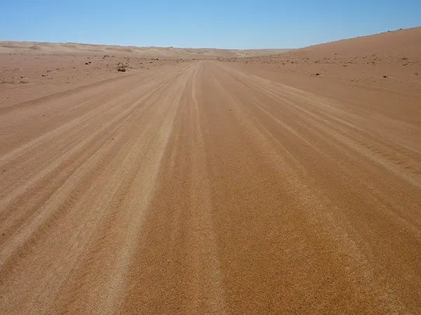 The wide desert road of Oman.