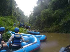 Getting off our rafts as we chop through the bamboos blocking the Ayung River.